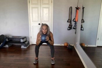 Squat with Weighted Ball
